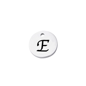 Detailed view of silver stainless steel round pendant with engraved cursive letter E