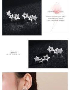 Detailed view of sterling silver star stud earrings with pave-set cubic zirconia stones
