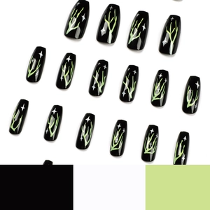 Cool black long coffin press-on nails with fluorescent green lightning and star designs