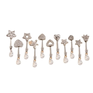 Silver titanium steel ear studs set with heart and star zircon pendants on white background
