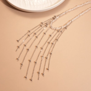 Elegant multi-layer silver tassel necklace with crystal beads and metal chain drapes