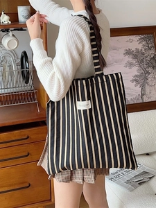 Striped canvas tote bag for women with wide shoulder strap in minimalist Korean style