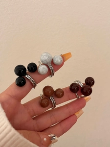 Three-layer open rings with colorful enamel beads in black, marble, and brown tones