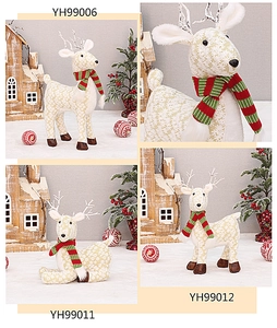 Detail of Christmas reindeer ornaments with floral fabric textures and striped scarves
