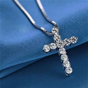 Classic silver cross necklace featuring sparkling round-cut crystals on a sleek chain