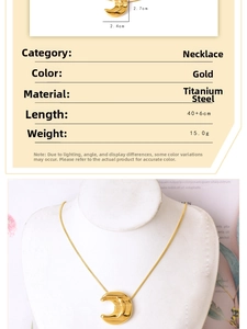 Detailed view of golden titanium steel moon pendant necklace with size and weight specs
