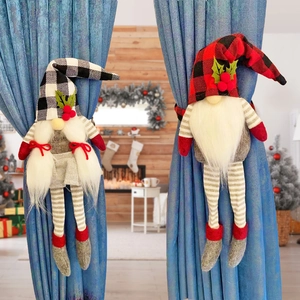 Christmas gnome curtain tiebacks with red and black plaid hats on blue curtains