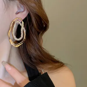 Gold plated irregular oval double hoop earrings with shimmering crystal accents for women