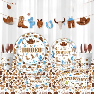 Detail of Western Rodeo themed party set with cow print plates, cups and cactus motifs