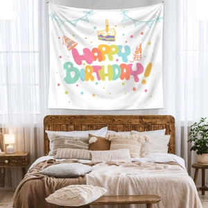 Detail of a white bohemian birthday tapestry with colorful letters and party illustrations