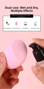 Macro shot of pink makeup sponge applying liquid foundation for a flawless finish