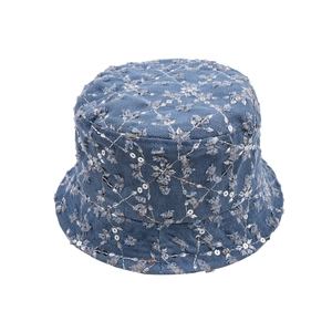 Blue denim bucket hat for kids with sequins and fringed diamond pattern on white background