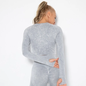 Detail view of seamless acid wash yoga set featuring thumb holes and scrunch butt design