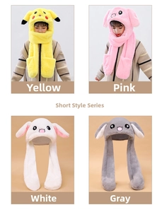 Detail of plush animal ear hats with movable ears in yellow, pink, white, and grey colors