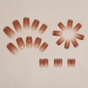 French ombré press-on nails with pink to brown gradient and silver glitter tips