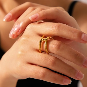 Fashionable gold plated stainless steel knot cross ring for women on finger