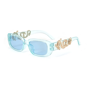 Retro rectangle sunglasses with light blue transparent frame and golden dragon detail