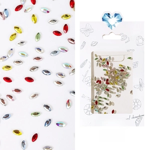 Macro detail of mixed marquise crystals and nail decorations in package #05