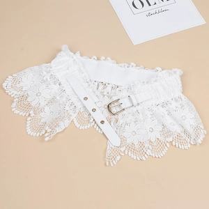 Detail of white floral lace corset belt with high elastic band and golden buckle