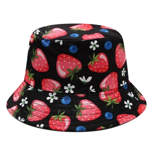 Reversible bucket hat with strawberry and blueberry prints for sun protection