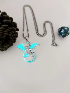 Luminous dragon pendant necklace with glowing blue effect on silver metal chain