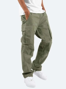 Detail view of cargo pants with large flap side pockets and durable cotton canvas texture