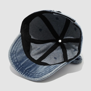 Inside view of washed blue denim baby baseball cap with sweatband and soft brim design