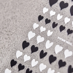Japanese style minimalist heart nail stickers in black and white for professional nail art