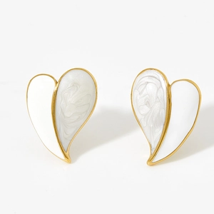 Detail of heart stud earrings with white enamel and marble texture on gold plating
