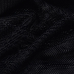 Detailed close-up of breathable black mesh fabric showing fine texture and sheer transparency