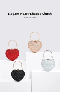 Close-up of four heart-shaped rhinestone evening bags in red, gold, black, and silver