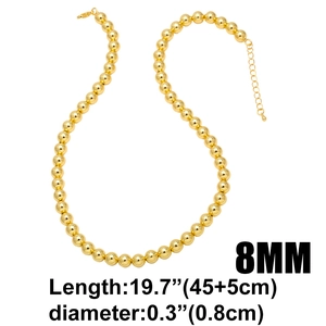 Detail view of 8mm gold beaded necklace chain with 45+5cm adjustable lobster clasp