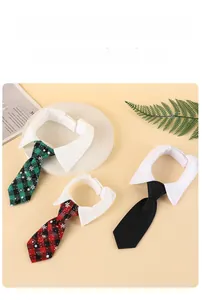 Close-up of adjustable pet neckties in plaid and black styles for cats and dogs