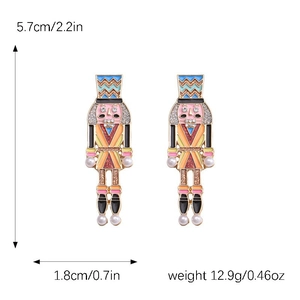 Nutcracker earrings with faux pearls and enamel finish featuring detailed size measurements