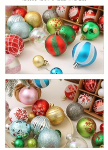 Detail of assorted Christmas balls with glitter, matte and snowflake patterns in a wooden box