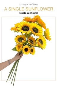 Detailed view of artificial sunflower with yellow petals and lifelike brown flower core