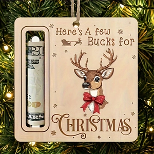 Close-up of wooden reindeer money holder ornament hanging on a festive Christmas tree