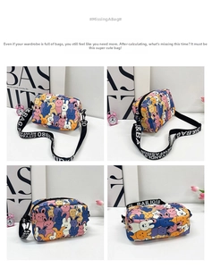 Detail view of cartoon rabbit print crossbody bag with wide black and white woven strap