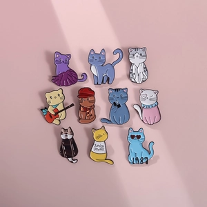 Set of 10 Taylor Swift inspired cat enamel pins featuring diverse musical era outfits