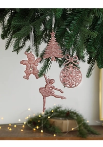 Pink glitter Christmas tree ornaments set with snowflake and ballerina shapes on pine branch