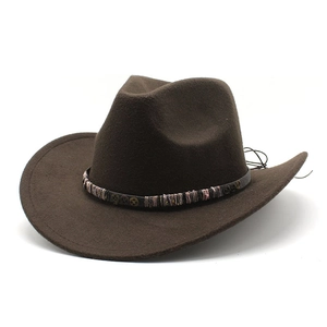Dark brown wide brim western cowboy hat with vintage gear band and wool felt texture