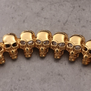 Vintage punk gold stainless steel skull bracelet with sparkling cubic zirconia eyes