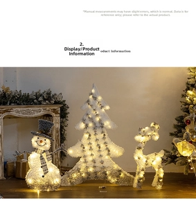 Close-up of lighted Christmas decor set with snowman and reindeer in warm LED glow