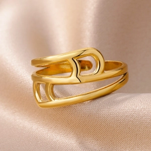 Macro shot of 18k gold plated stainless steel open ring with hollow geometric lines