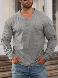 Detail of grey V-neck sweater showing textured knit pattern on slim fit men top