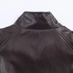Detailed close-up of dark brown faux leather jacket collar with high-quality stitching