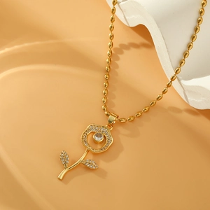 Golden rose pendant necklace with shimmering crystals and elegant beaded chain