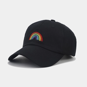 Detailed close-up of a black cotton baseball cap featuring colorful rainbow embroidery