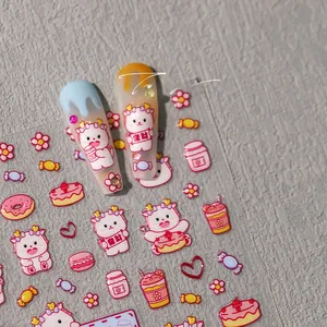 Macro view of 3D cartoon dragon nail stickers with cute dessert patterns and characters