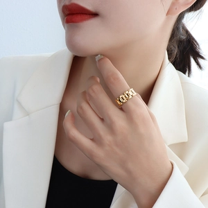 Golden watch-link style stainless steel wide ring with high-polished metal finish
